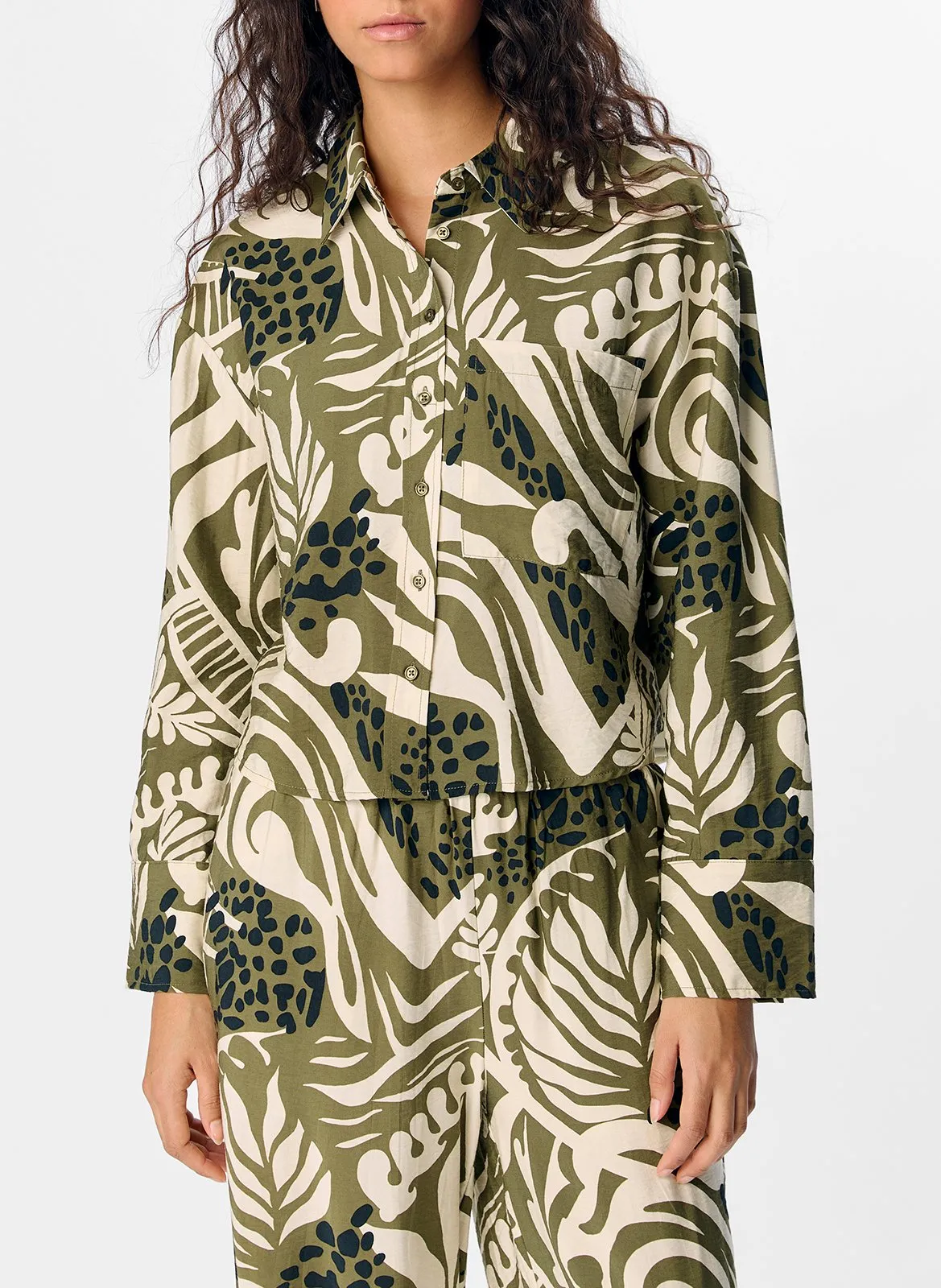 Ärmellose Bluse mit klassischem Kragen und Print Grun