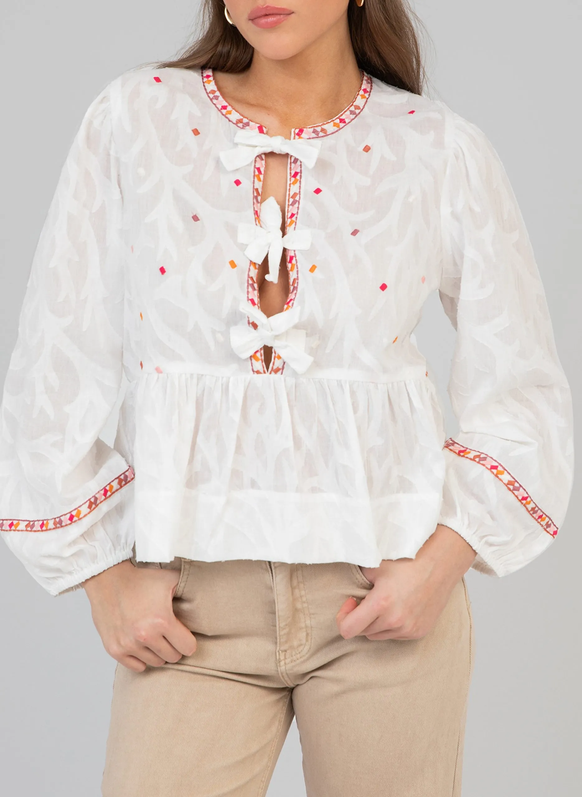 Weite Bluse mit fantasievollen Details Beige SERVANE