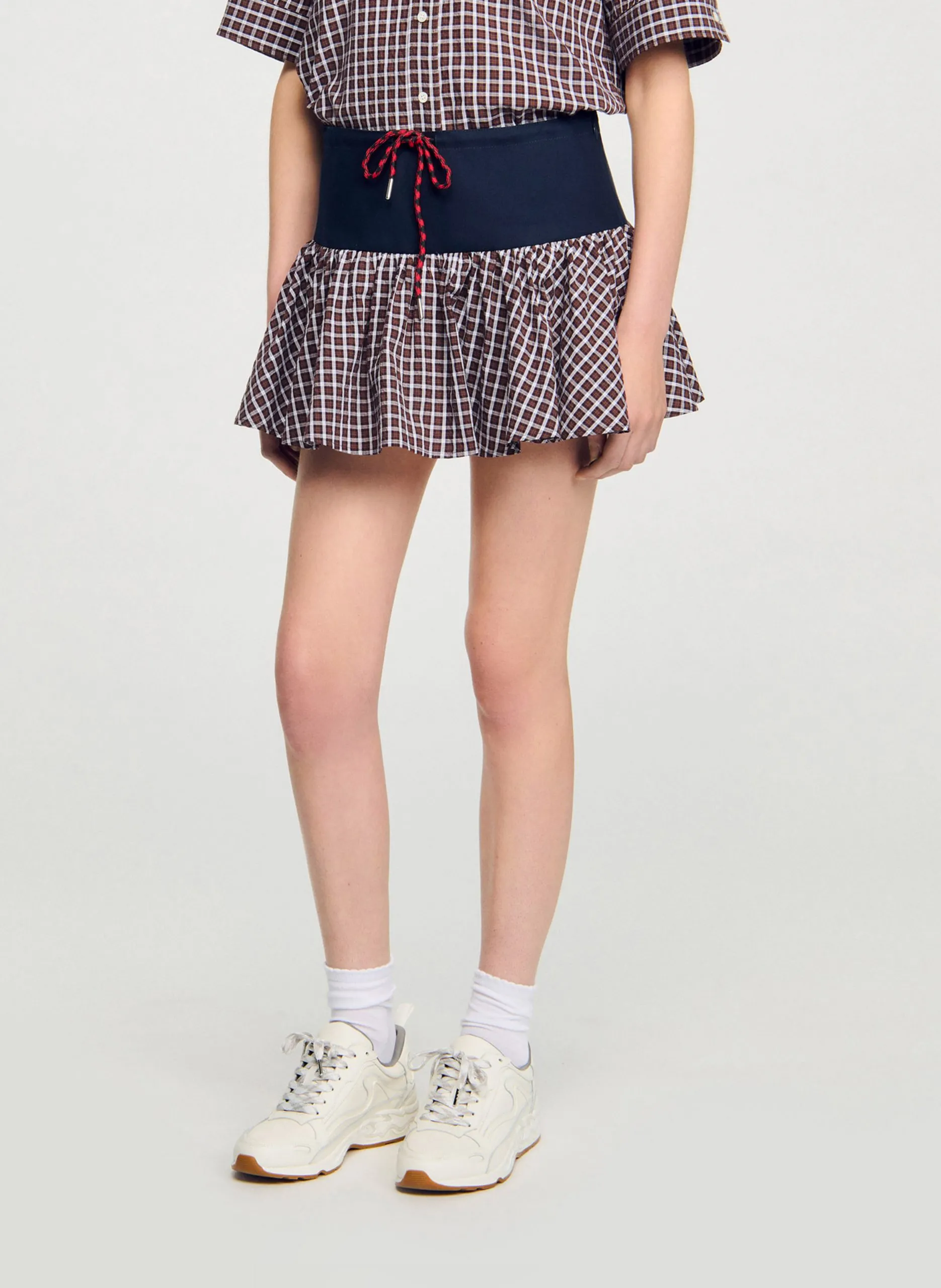 Ausgestellter Minirock mit Muster Braun