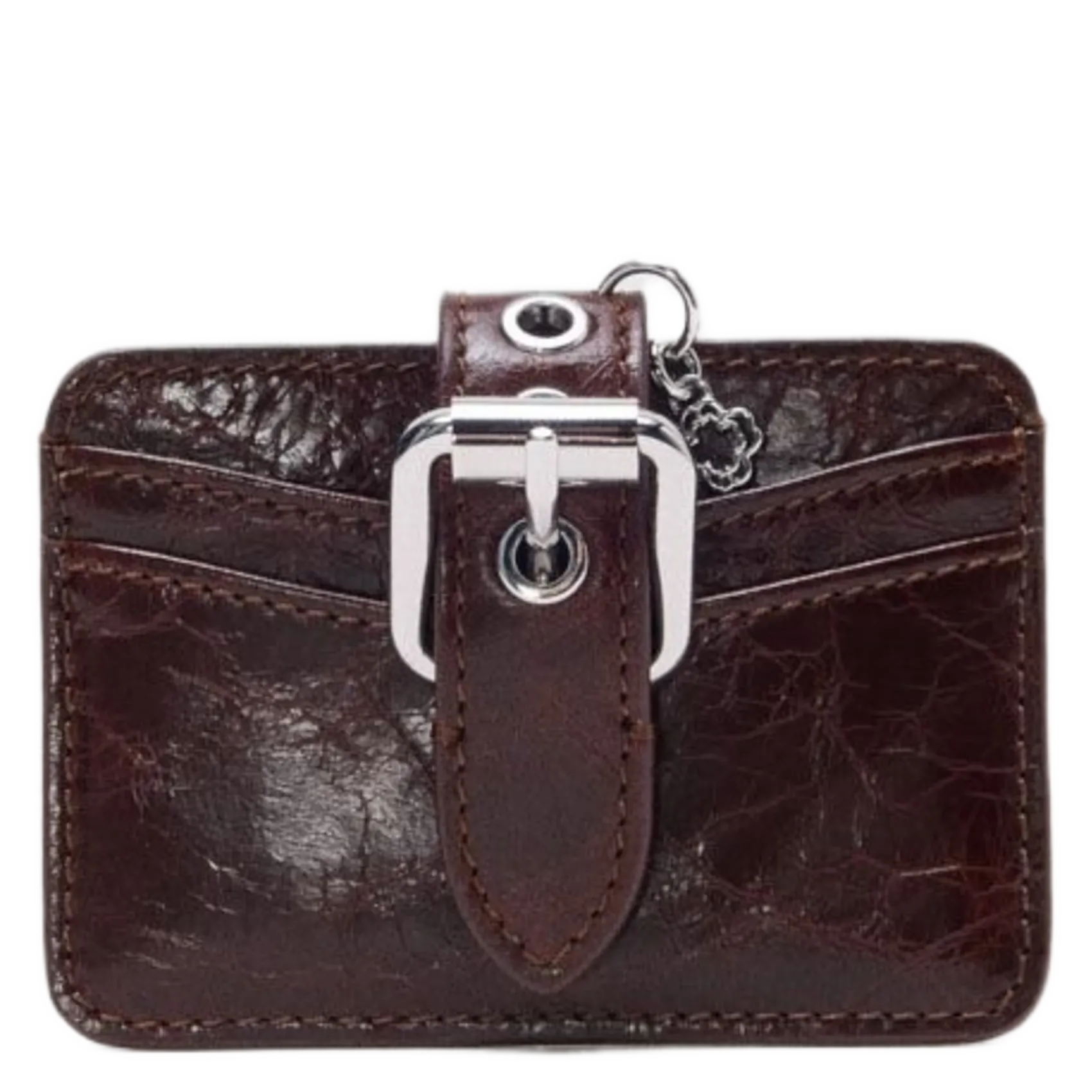 - 100 % Leder, - 6 Kartenschlitze, - 1 zentrale Tasche, - Maße: B10 x H7 cm. Braun